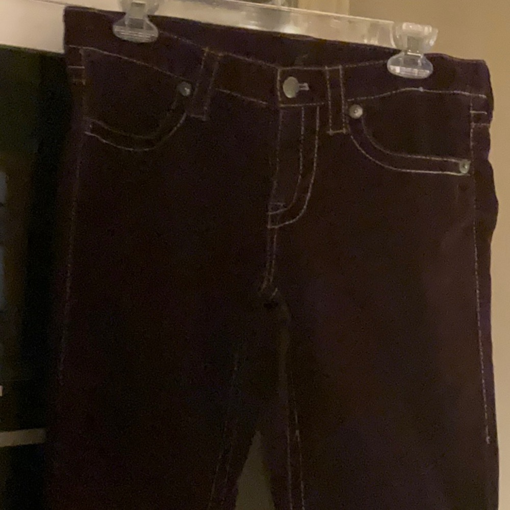 This is Victoria’s Secret London Jeans in a dark purple.